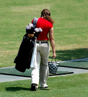 Lady at driving range