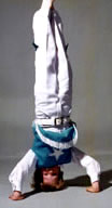 Boy doing head stand